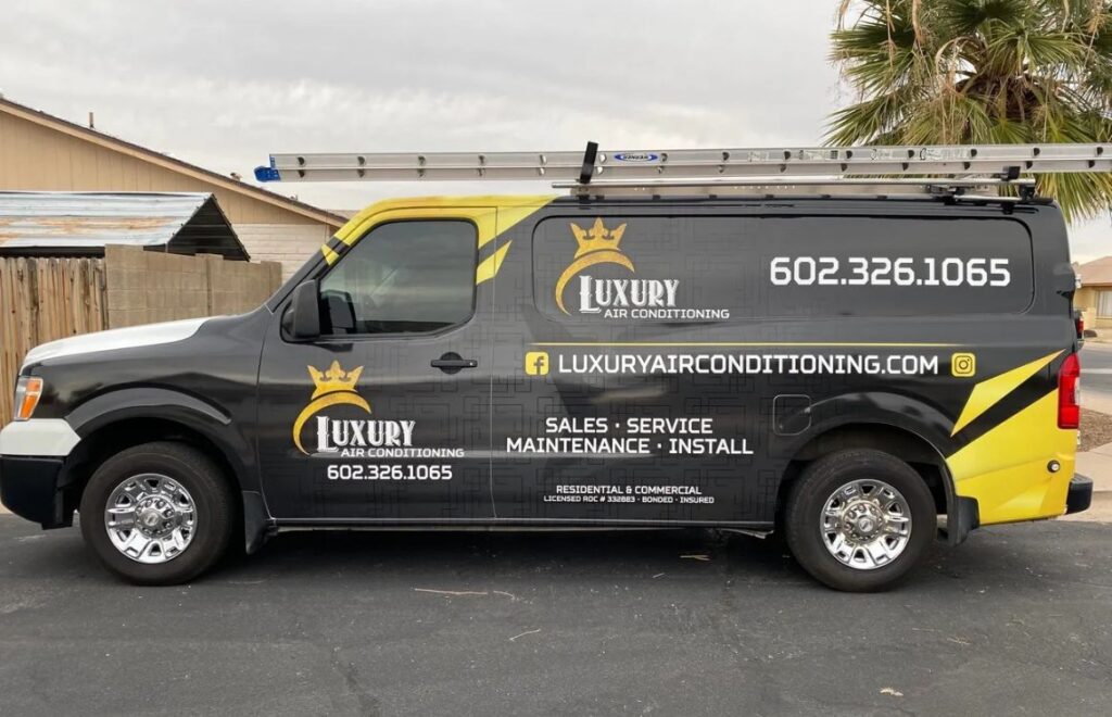 lacp-img-17 Luxury Air Conditioning service van showcasing branding, contact info, and services like sales, installation, and maintenance.